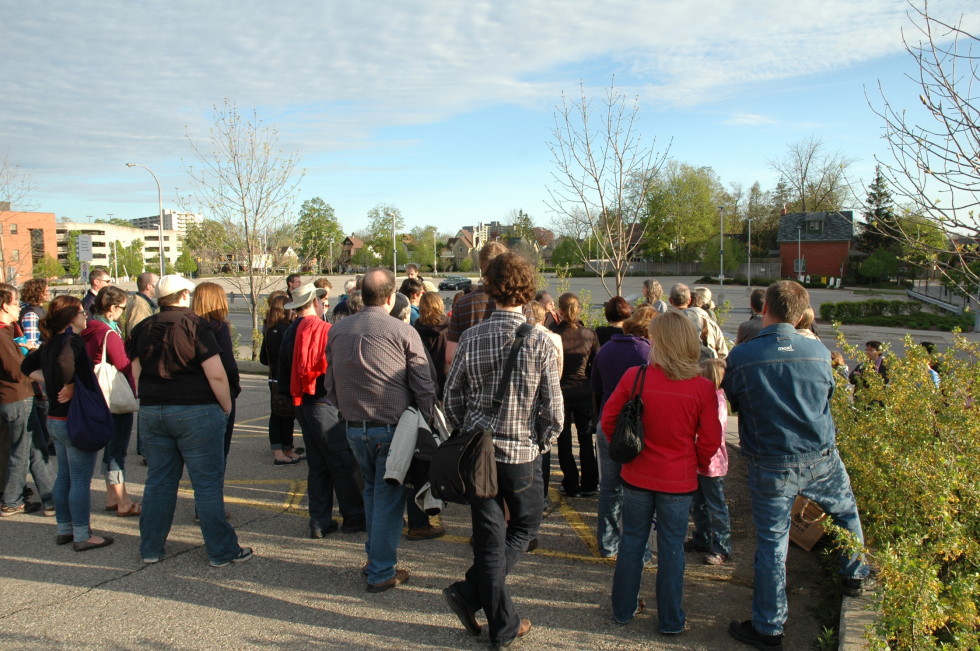 Photo: A crowd gatherings at The Tannery in the spring evening sun.