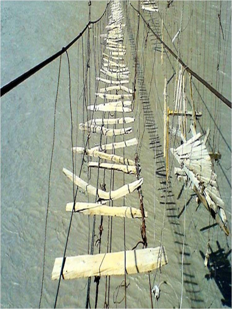 Photo: Rickety dangerous suspension bridge
